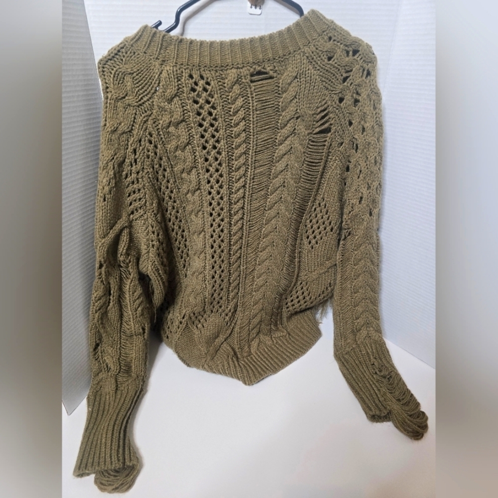 Distressed sweater